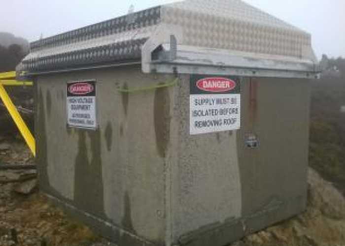 Weather cover for remote electrical housing 1