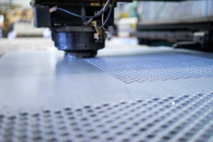 Perforating sheet on CNC punch